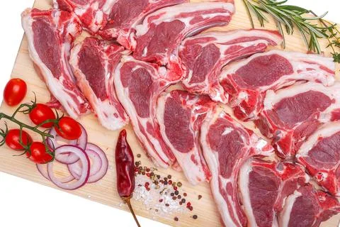 Raw meat brisket, beef bone, wooden cutting board, white isolated background Stock Photos