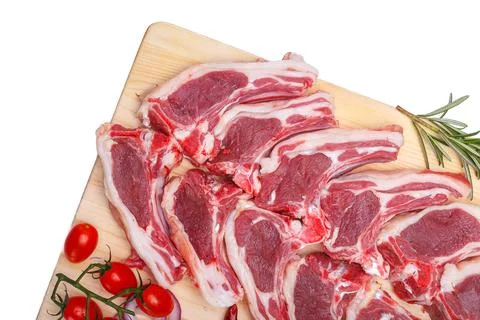Raw meat brisket, beef bone, wooden cutting board, white isolated background Stock Photos