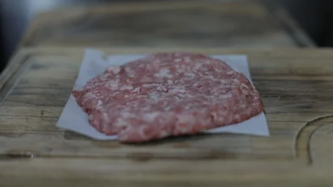 Raw Meat Burger Ready to Grill Stock Footage 128463599