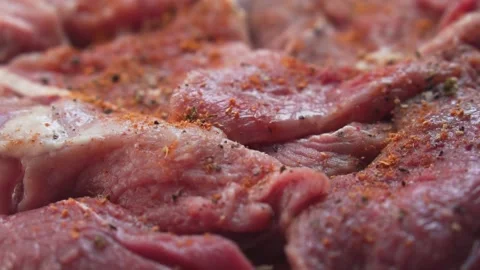Raw meat close up in slow motion. Stock Footage 135432369