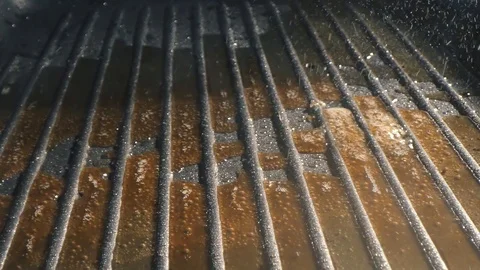 Raw meat cutlet falls into the pan. Stock footage. Burger Patty falls on the pan Stock Footage 115774469