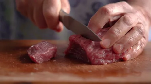 Raw meat cutting with sharp knife close up 库存影片 182005685