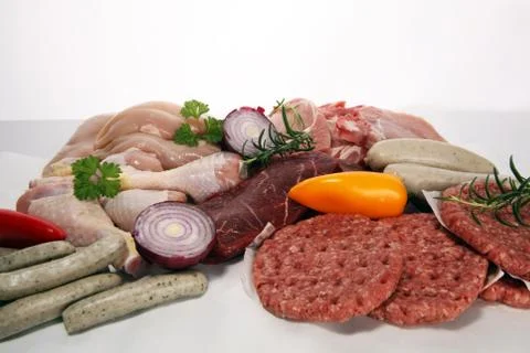 Raw meat. Different types of raw pork meat, chicken and beef with spices and  Stock Photos