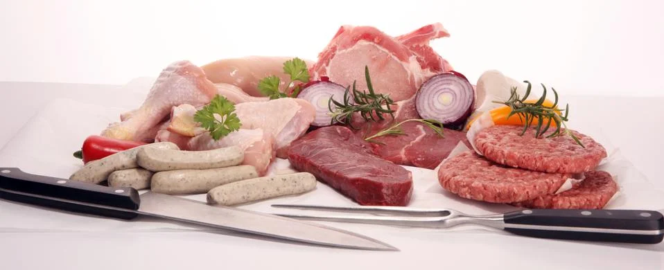 Raw meat. Different types of raw pork meat, chicken and beef with spices and  Stock Photos