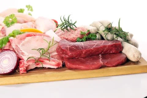 Raw meat. Different types of raw pork meat, chicken and beef with spices and  Stock Photos