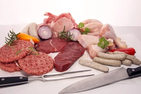 Raw meat. Different types of raw pork meat, chicken and beef with spices and  Stock Photos