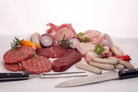 Raw meat. Different types of raw pork meat, chicken and beef with spices and  Stock Photos