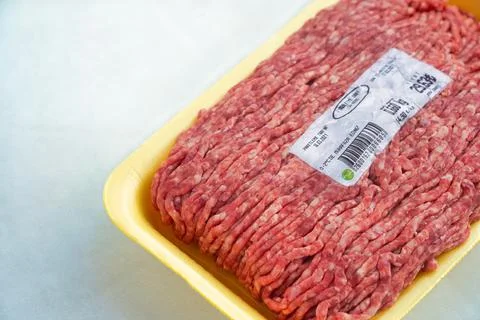 Raw meat package with barcode Stock Photos