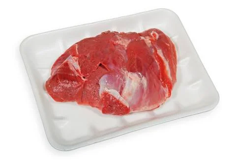 Raw meat in packaging isolated on a white background. Stock Photos