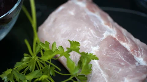 Raw meat with parsley. Stock Footage 117227821