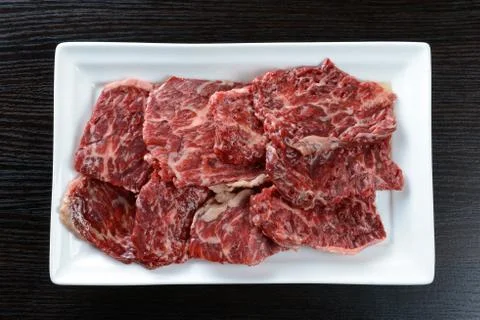 Raw meat on a plate Stock Photos