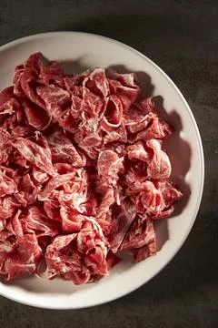 Raw meat on a plate Stock Photos