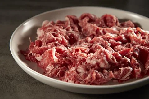 Raw meat on a plate Stock Photos