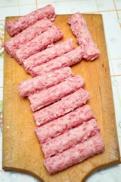 Raw meat rolls Stock Photos
