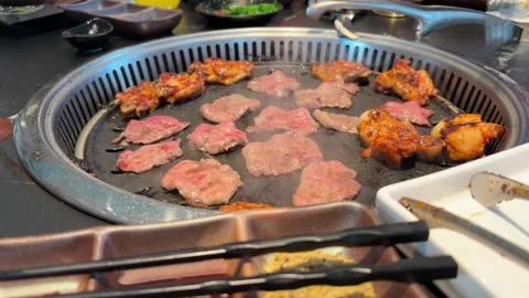 Raw meat slices and chicken, beef and squid pieces cooking tabletop built i.. Stock Footage 335392308