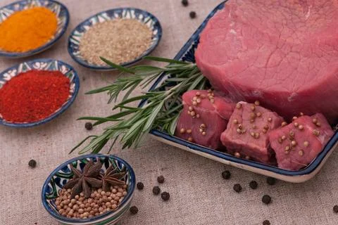 Raw meat with spices Stock Photos