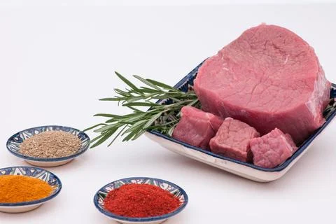 Raw meat with spices Stock Photos