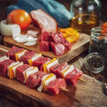 Raw meat stick Stock Photos