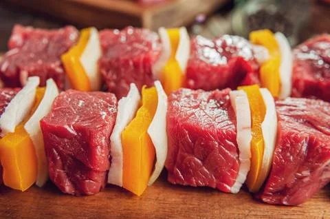 Raw meat stick Stock Photos