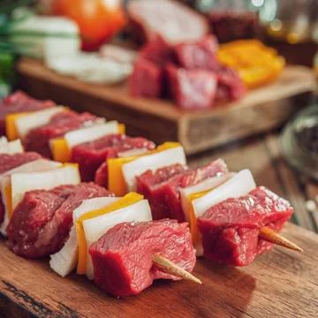 Raw meat stick Stock Photos