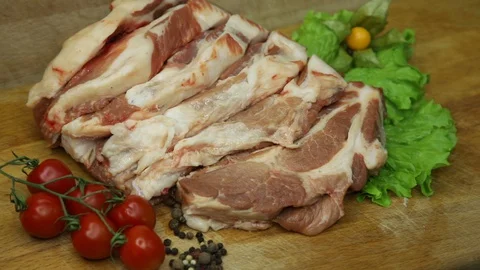 Raw meat svininy different pieces with lovely decor from the chef. Stock Footage 130002675