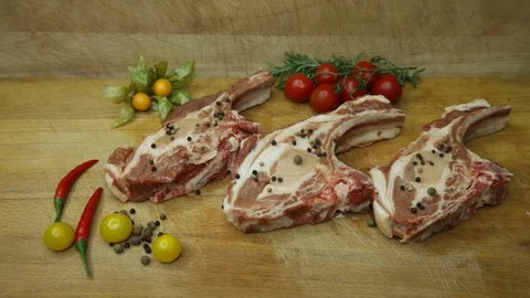 Raw meat svininy different pieces with lovely decor from the chef. Stock Footage 130002676
