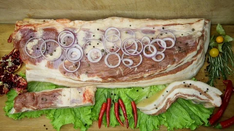 Raw meat svininy different pieces with lovely decor from the chef. Stock Footage 130002952