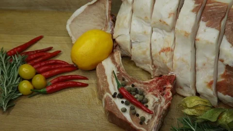 Raw meat svininy different pieces with lovely decor from the chef. Stock Footage 130002953