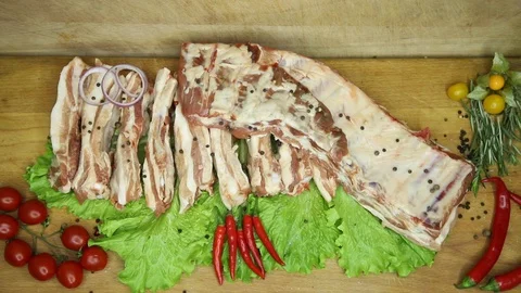 Raw meat svininy different pieces with lovely decor from the chef. Stock Footage 130002955