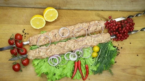 Raw meat svininy different pieces with lovely decor from the chef. Stock Footage 130002970