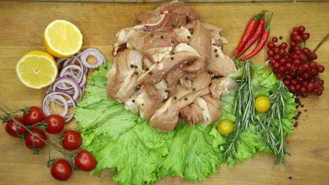 Raw meat svininy different pieces with lovely decor from the chef. Stock Footage 130003040