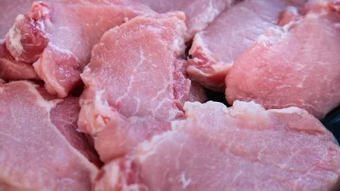 Raw Meat Texture Background with Fresh Pork Slices Close-Up Stock Photos