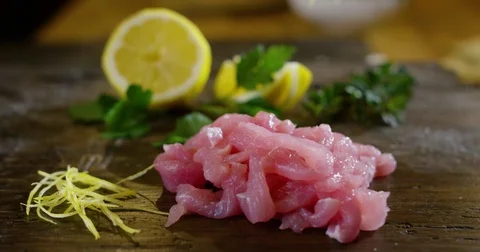 Raw Meat With Twist Of Lemon Stock Footage 79447989