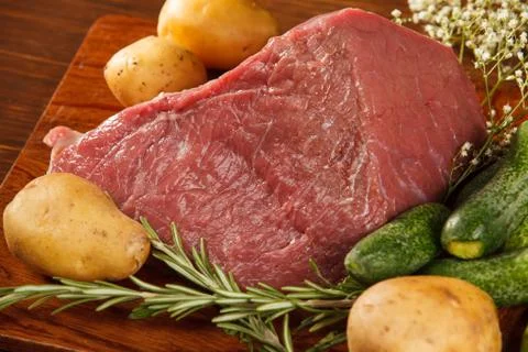 Raw meat with vegetables Fotos Stock