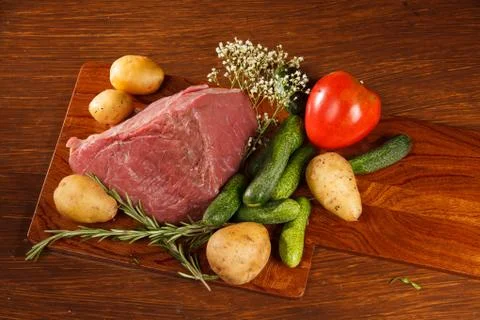 Raw meat with vegetables Stock Photos