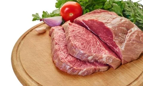Raw meat with vegetables Stock Photos