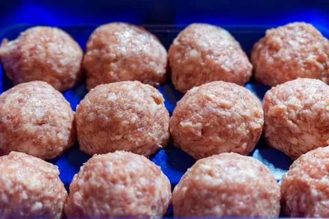 Raw meatballs in plastic container ready to cook delicious food 스톡 사진