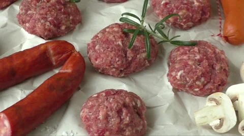 Raw minced hamburger meat with herb and spice prepared for grilling Stock Footage 61366443