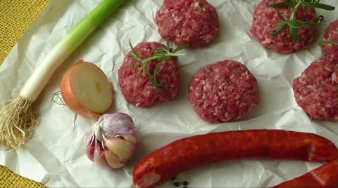 Raw minced hamburger meat with herb and spice prepared for grilling Stock Footage 61366470