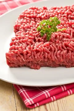 Raw minced meat on kitchen table Stock Photos