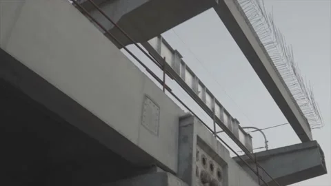 Raw Moving Footage of A construction Metro Bridge Stock Footage 221020547