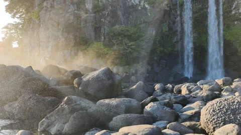 Raw natures power displayed by falling water. Continuous water energy carves Stock Footage 323362112