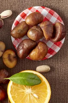 Raw Nuts And Oranges Stock Photos