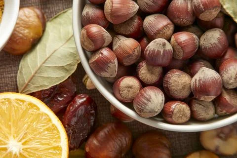 Raw Nuts And Oranges Stock Photos