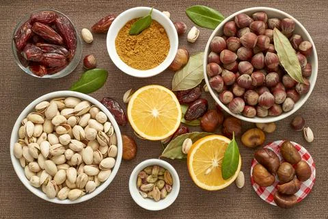 Raw Nuts And Oranges Stock Photos