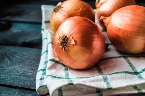 Raw onions on a table Stock Photos