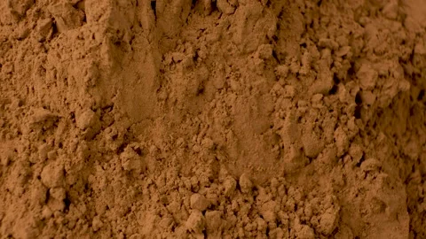 Raw organic cocoa powder texture background rotating. Stock Footage 335836105
