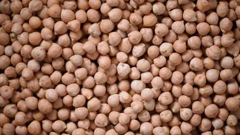 Raw organic dried chickpea texture on rotating background. Vegan healthy Stock Footage 122168440