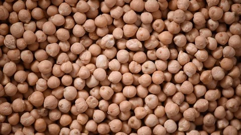 Raw organic dried chickpea texture on rotating background. Vegan healthy Stock Footage 122168981