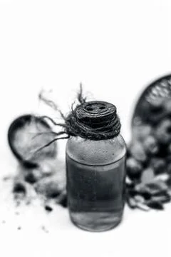 Raw organic dried dates in a hamper with its extracted oil and its powder in  Stock Photos